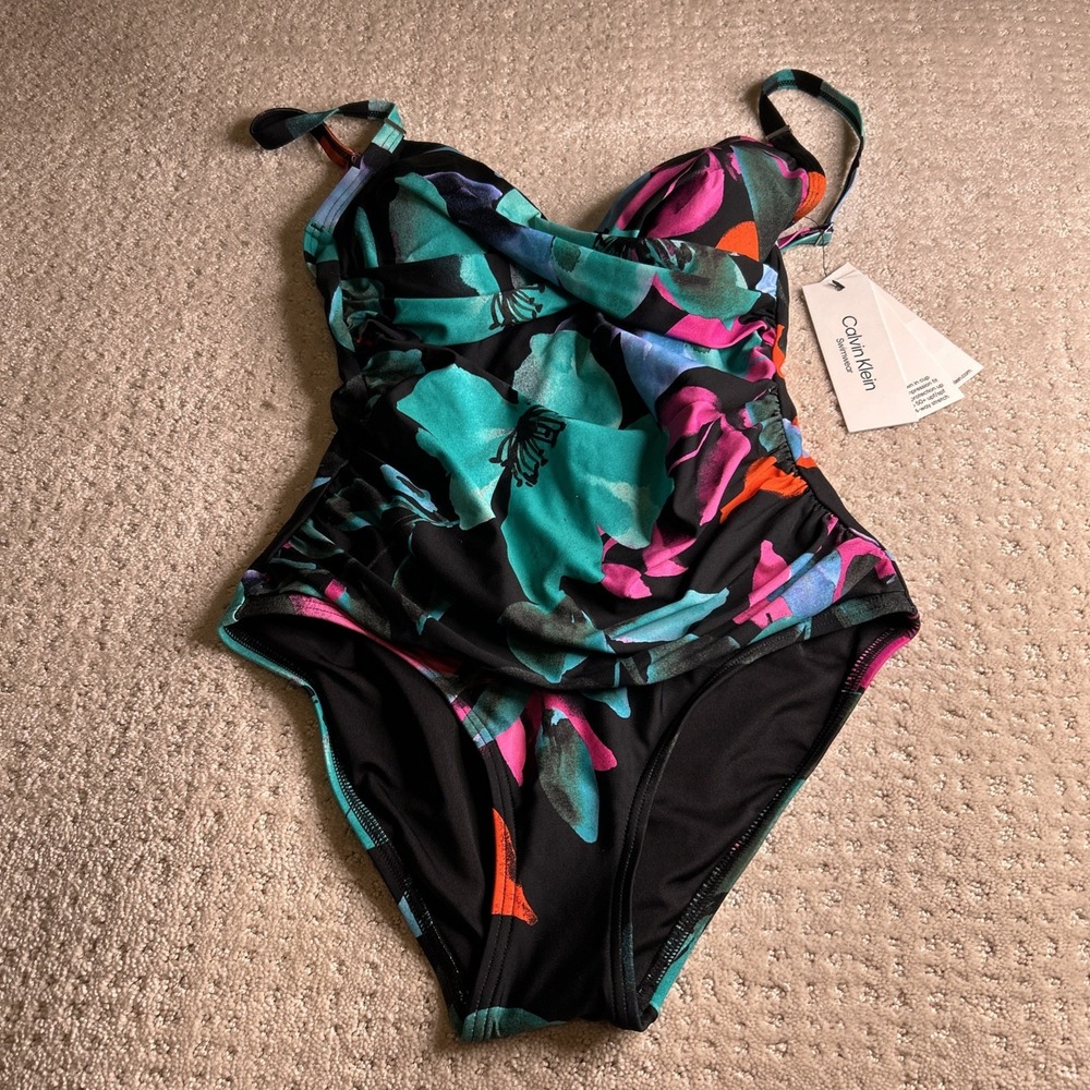 Calvin Klein one piece swimsuit size‎ 4 With Side Rouching new